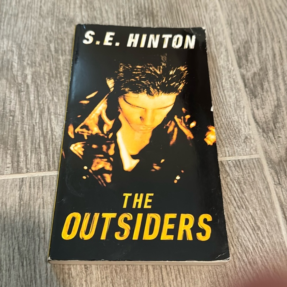 The Outsiders Paperback Novel - Black and Yellow Cover